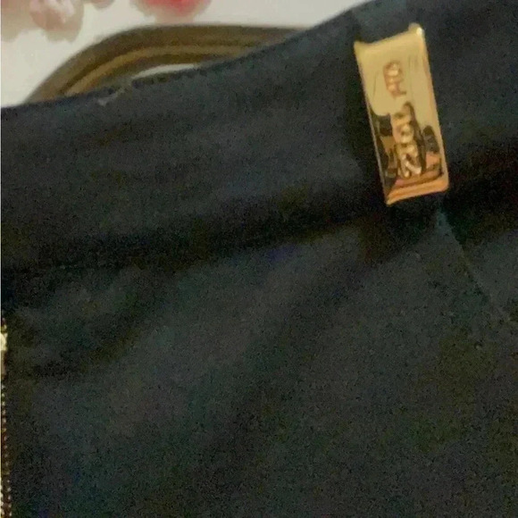 St. John black jeans in new condition . Gorgeous hardware around the belts . - Picture 7 of 14